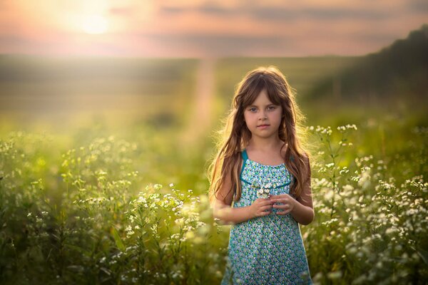 A girl in a dress in the Russian open spaces