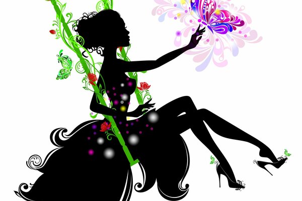 Silhouette of a girl on a swing in flowers