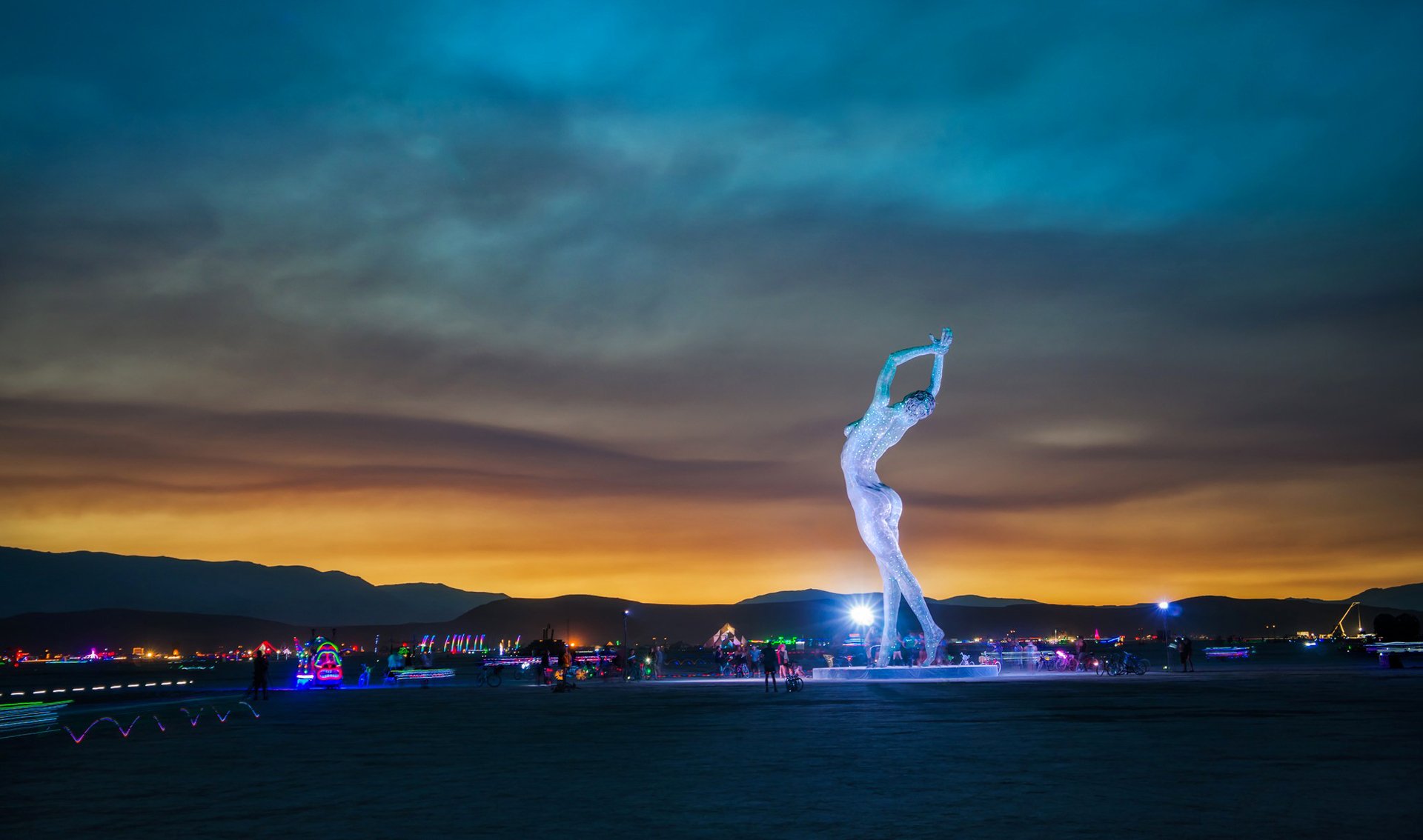 burning man- nevada usa art art people mountains sunset lady dancing