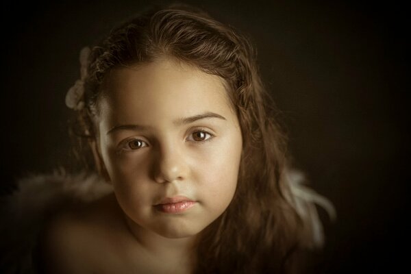 Portrait of a brown-eyed girl with long hair