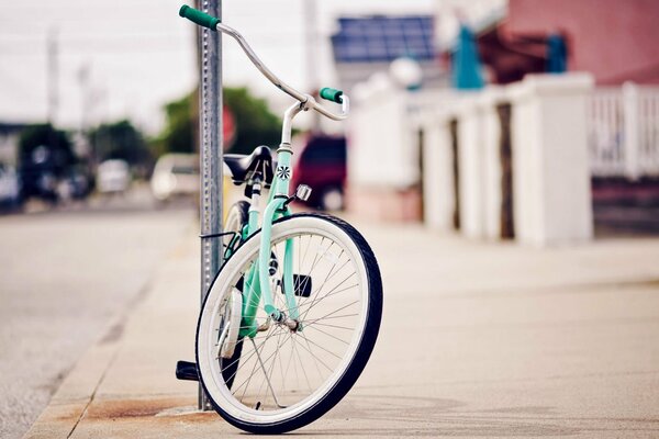 Blurry photo of a bicycle on the street