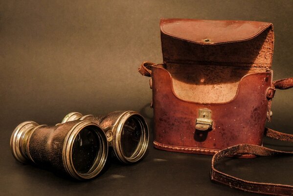 Antique binoculars and a leather case. The end of the nineteenth century