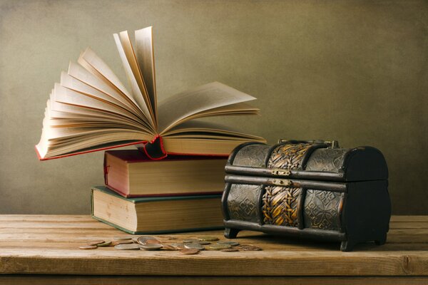 An old chest and an open book