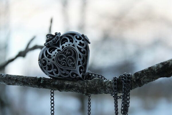 Decoration in the form of a heart on a branch