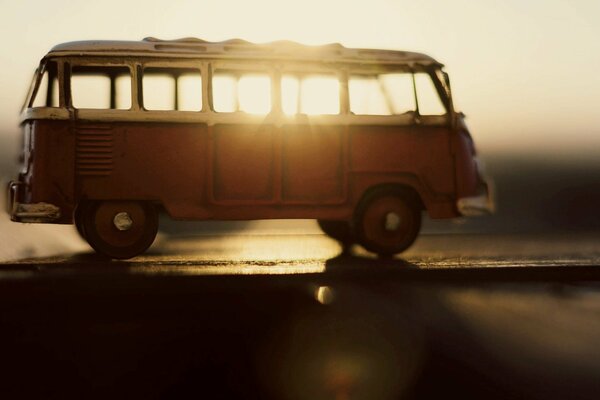 Toy bus in the sunset