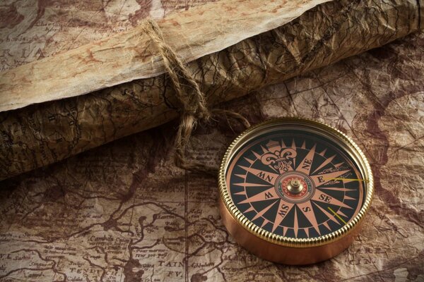 Retro compass image on the map background