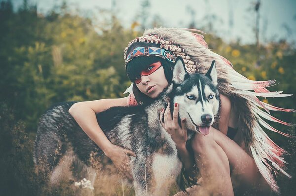 Indian tribal girl with a wolf