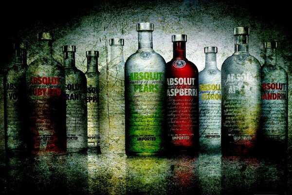 Different types of vodka in glass bottles. Vodka absolute