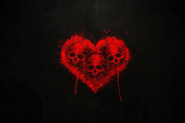Trois crânes en coeur rouge sur fond noir
