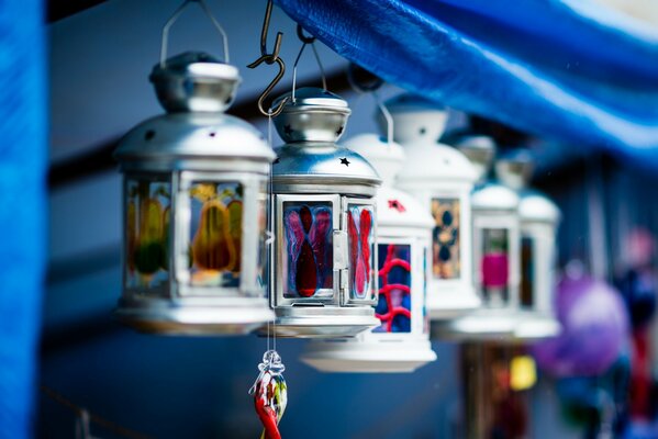 Beautiful Ikea lanterns hang next to each other