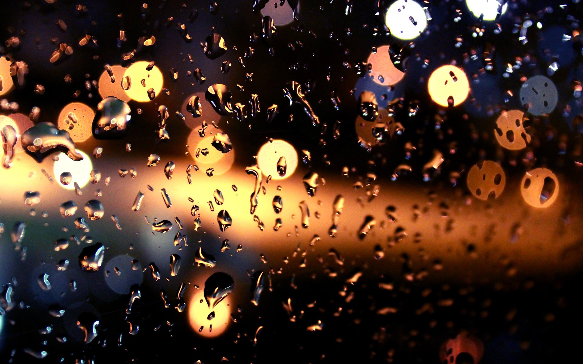 verre nuit lumières gouttes pluie bokeh