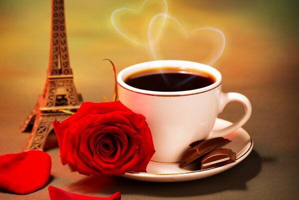 Заставка чашка кофе с шоколадом и цветком розы