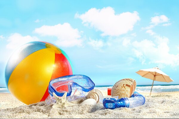 Plage, avec des accessoires de plage lunettes balle et parapluie