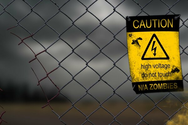 Warning about a zombie attack on the background of an iron fence