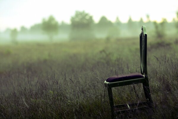 A chair in a fog as in a white deception