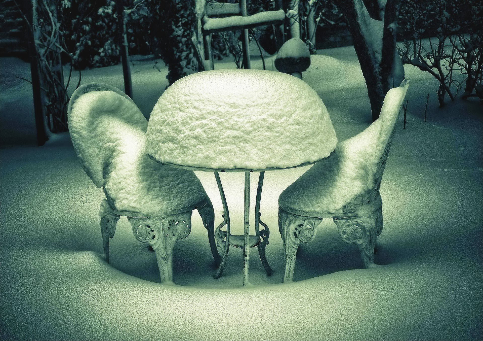 winter snow frost snowdrifts forest trees table chairs table furniture powdered