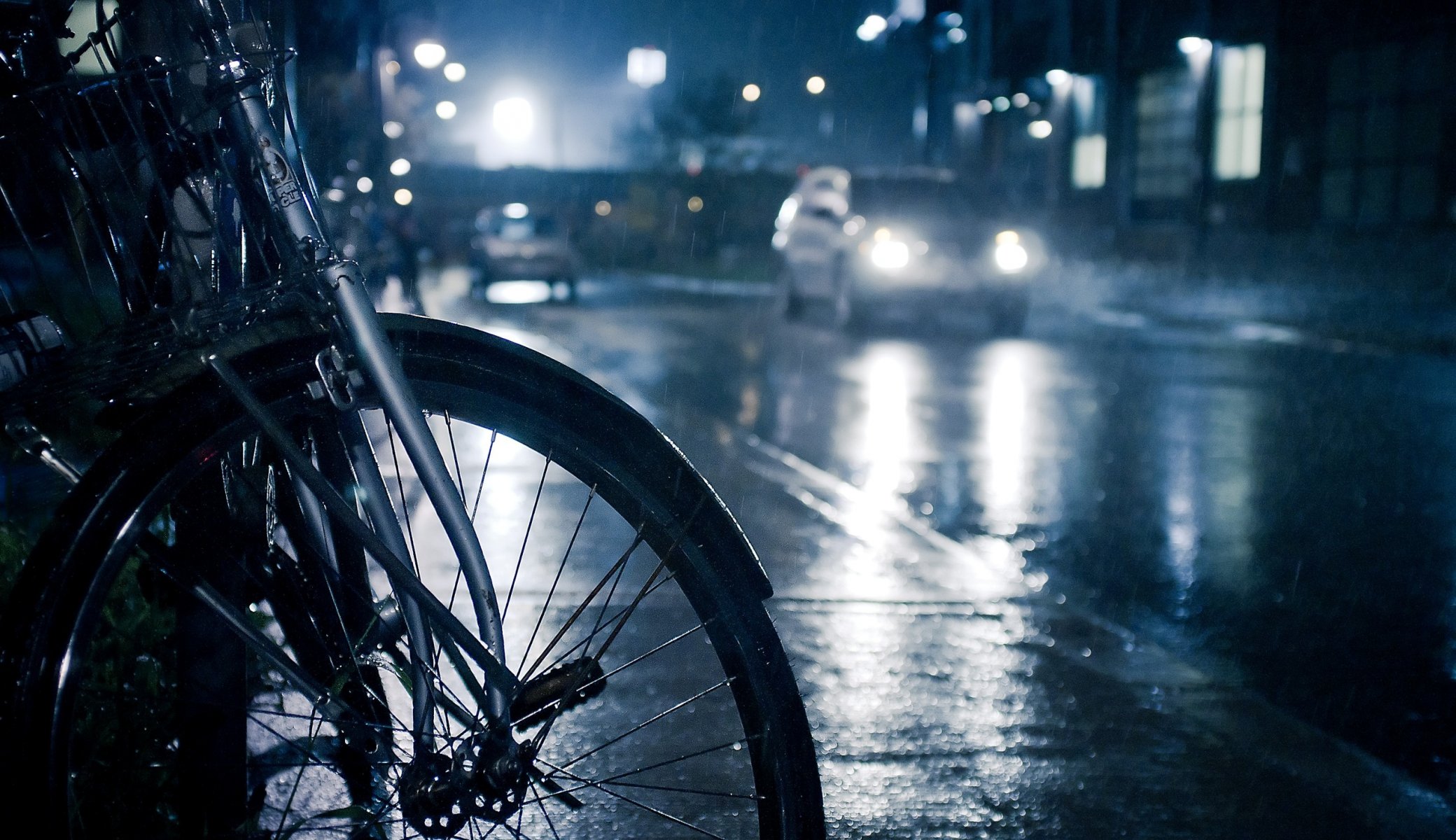 night rain downpour drops road cars lights sidewalk puddles bicycle photos miscellaneous wallpaper