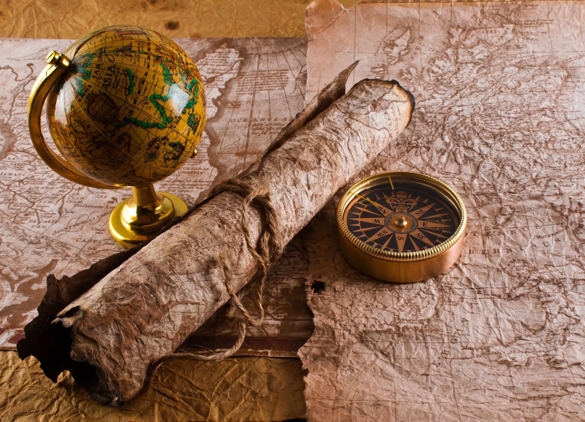 compass manuscript rope card globe