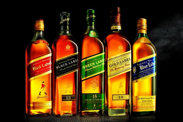 Green label bottles on a dark background