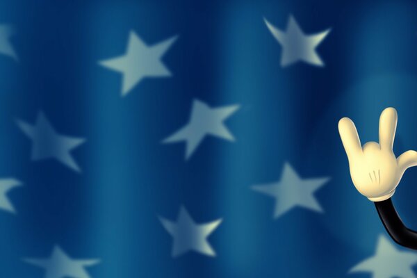 Синий флаг с белыми звездами и рука микки мауса