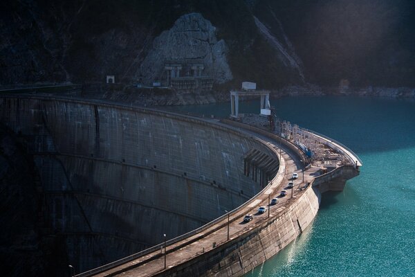 Hydroelectric power station and the road on which cars travel