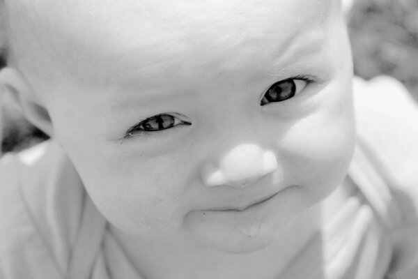 Baby drooling black and white image