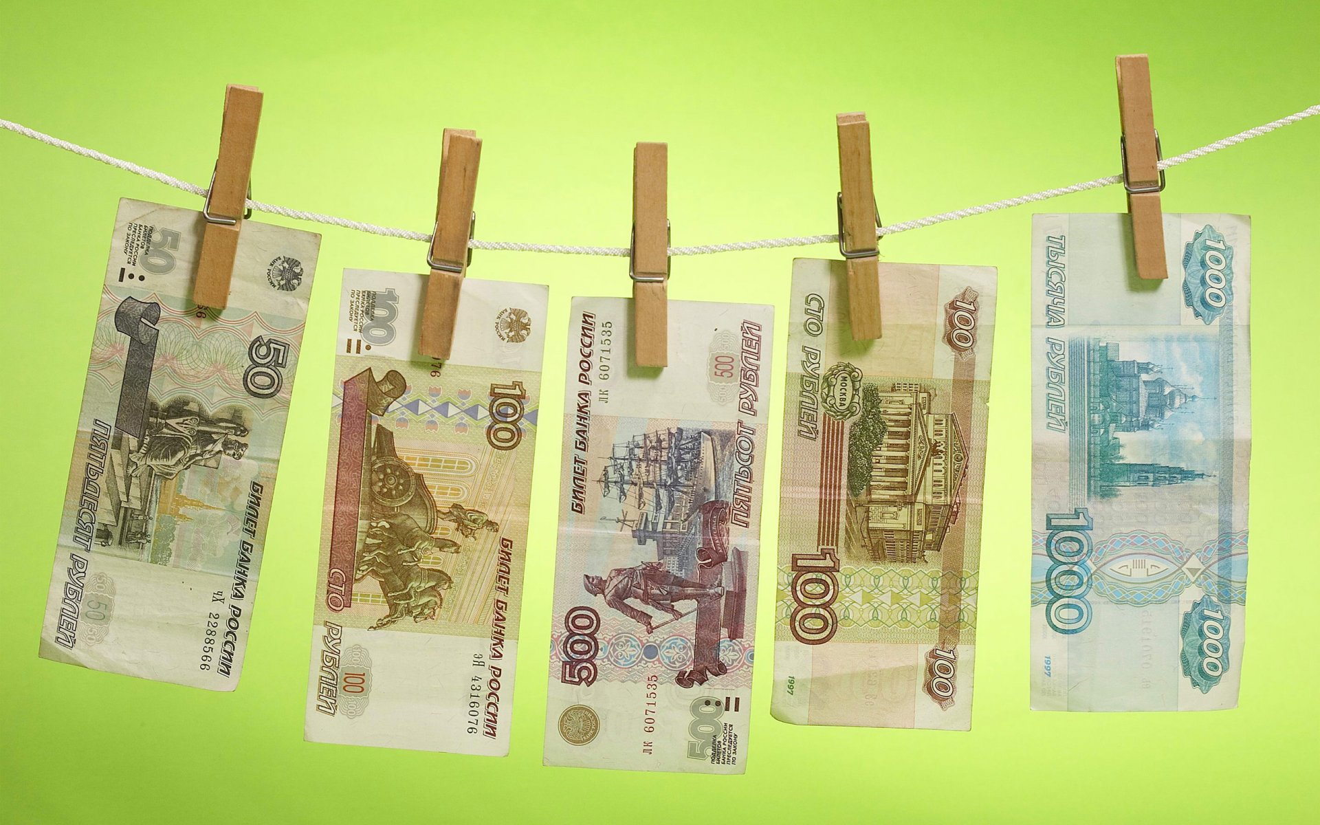 money russian rubles notes drying clothespin