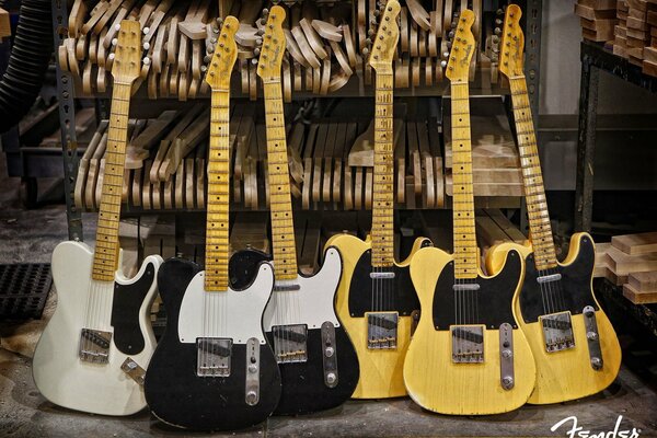 Guitarras negro, amarillo, blanco