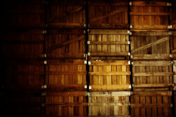 A picture of wooden boxes in the basement