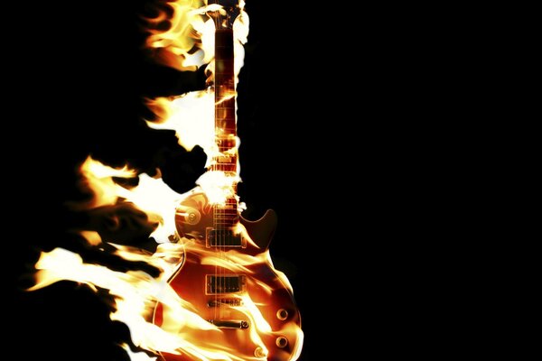 Stilvolle Gitarre in der Flamme des Feuers