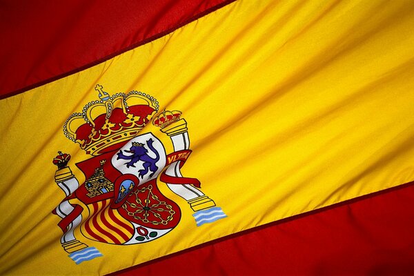 The national flag of Spain with the emblem