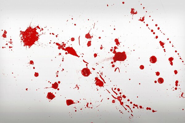 A picture of a splash of blood on white