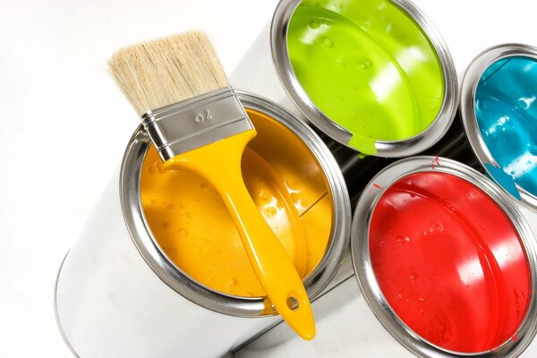 Cans of paint in bright colors