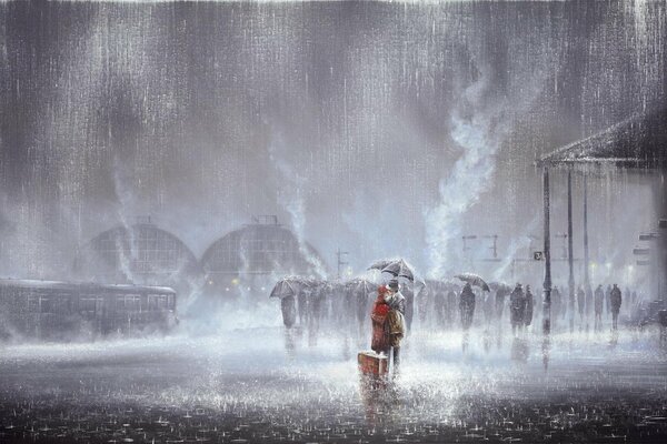 Nella foto di Jeff Rowland, i due si baciano sotto la pioggia