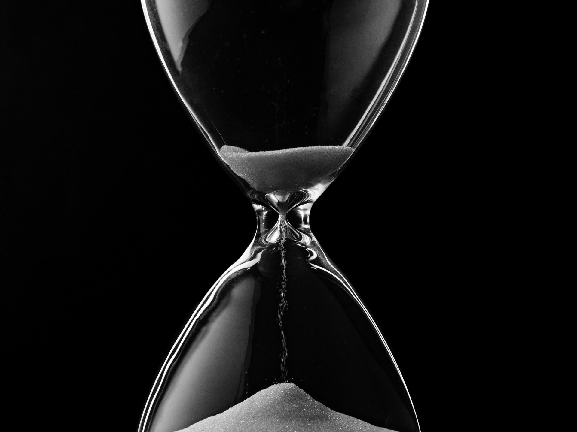 hourglass sand black glass time