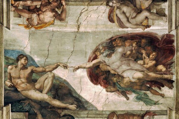 Фреска под названием Сотворение Адама художника Микеланжело