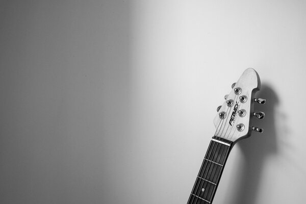 Guitar in a black and white room