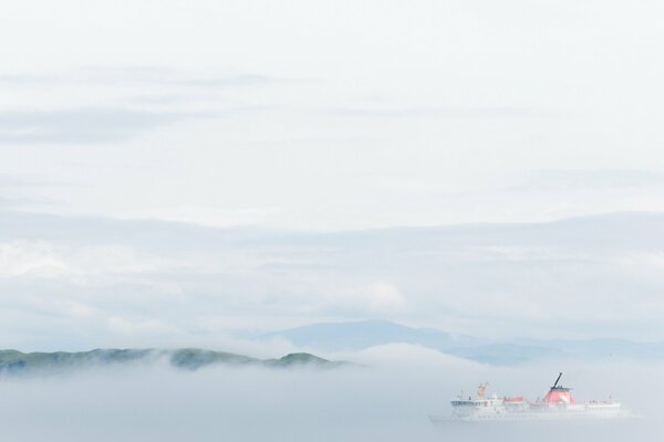 A ship sailing home in the fog