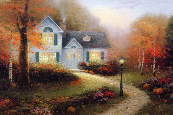 Biały Dom z niebieskimi okiennicami w okresie jesiennym