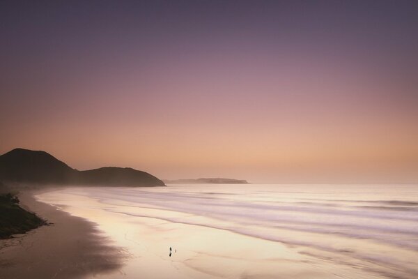 Lilac sunset on the seashore