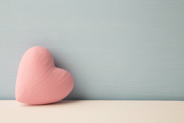 Pink heart on a blue background