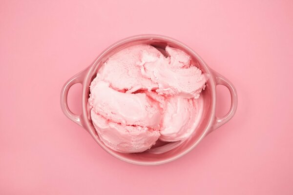 A cup of delicious strawberry ice cream