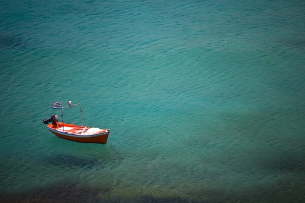 A lonely boat on calm water