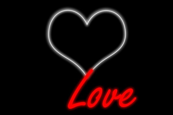 Image vive d un coeur avec l inscription Love sur fond noir