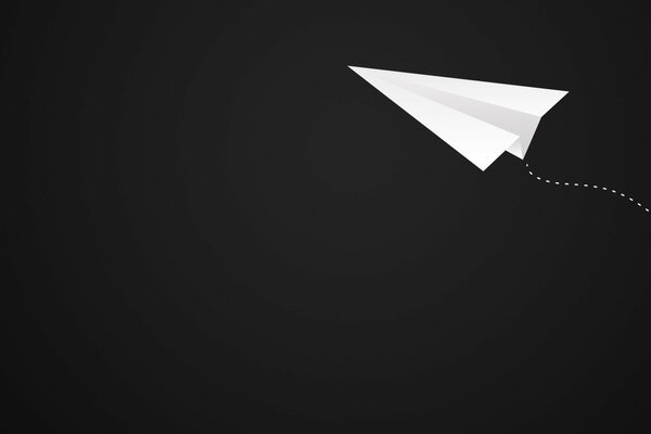 Paper airplane on a yellow background