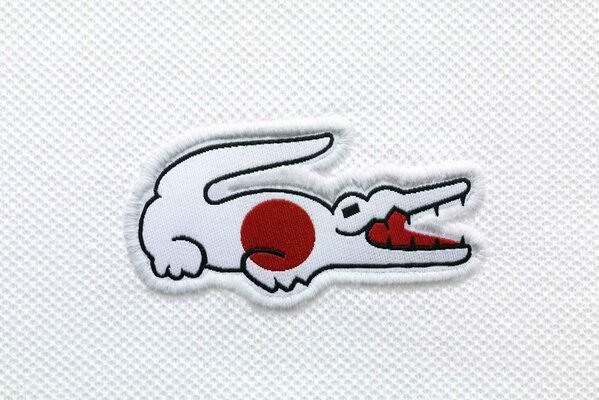 Japan-Flagge auf dem Lacoste-Krokodil