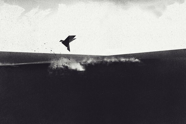 Pájaro de papel volando sobre el campo