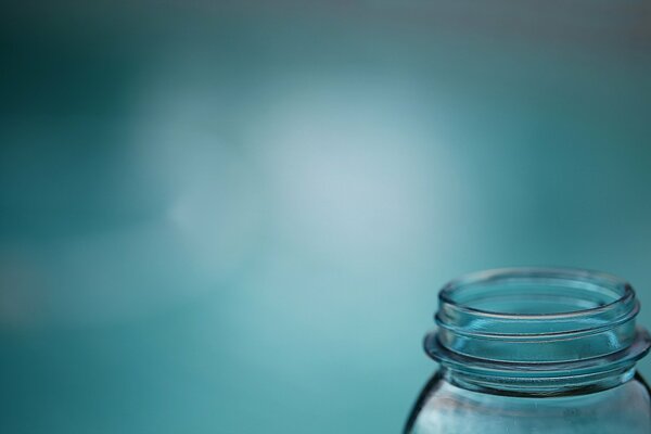 Against the background of a glass jar