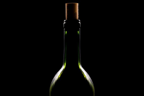 A bottle of wine on a dark background