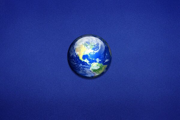 Minimal art. Planet Erde auf blauem Hintergrund